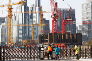 China’s economy “better than expected” but “downward pressure remains” – top policymakers