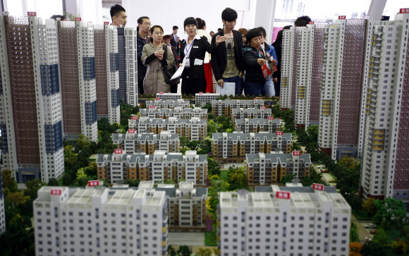 China’s new home price growth slowed in August as property restrictions step up, some say turning point for housing market emerges