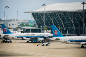 Shares of Chinese airlines slid as three largest state-owned carriers posted record loss in Q3