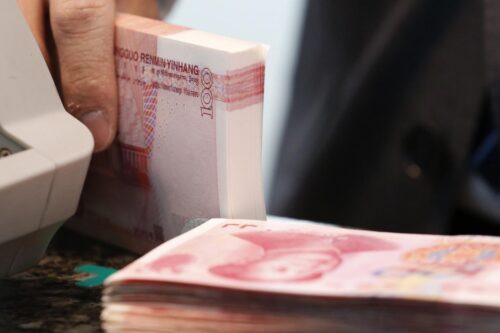 Foreign investors ramped up holdings of yuan bonds in April as dollar crunch eases