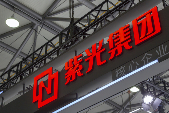 China chip maker Tsinghua Unigroup defaults on $450 million bonds triggers cross-defaults worth $2 billion