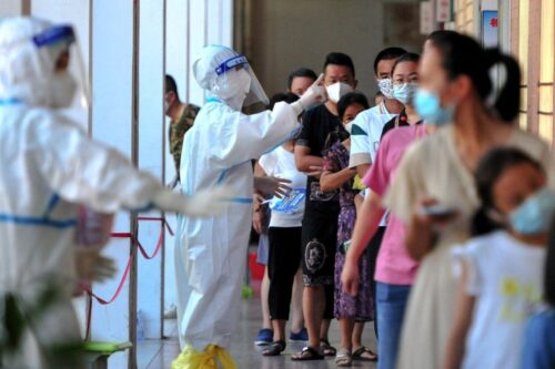 More than 20 provincial-level regions in China reported local Covid case in latest outbreaks